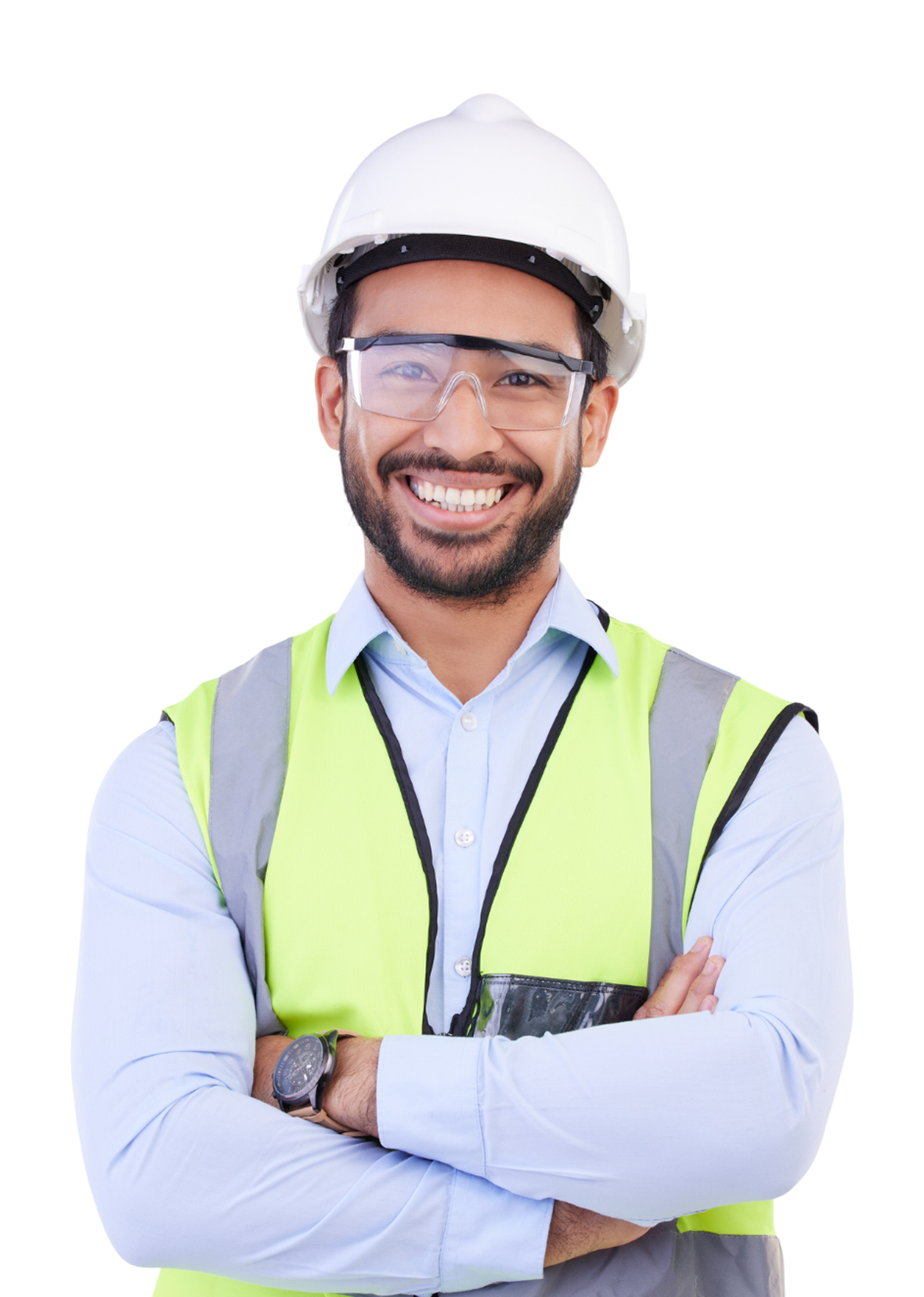 Smiling construction worker wearing safety gear with arms crossed.