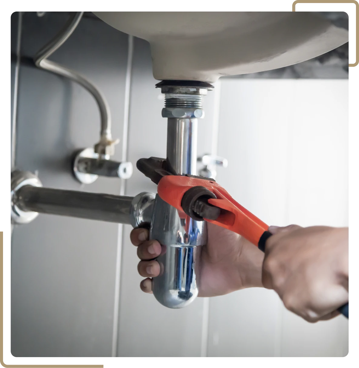 Hand repairing bathroom pipe