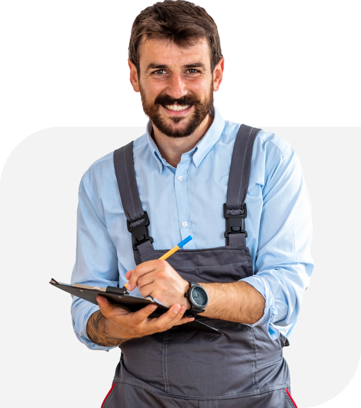 Man smiling with clipboard and pencil